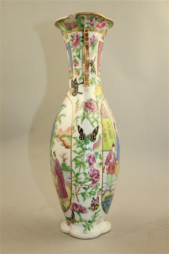 A Chinese Canton-decorated famille rose two handled vase, Jiaqing / Daoguang period, 31.5cm, rim chip